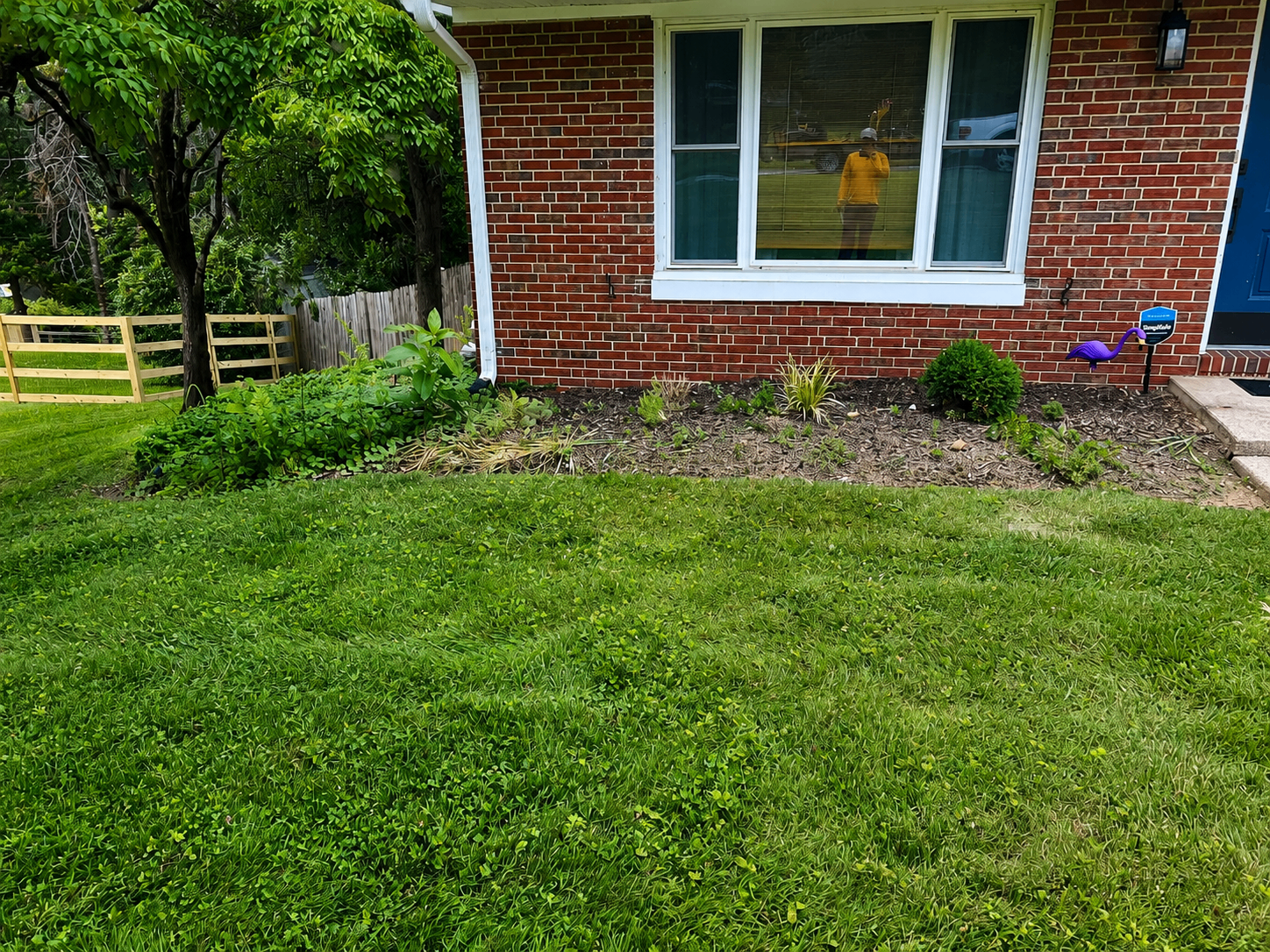 Brick ranch front bed before